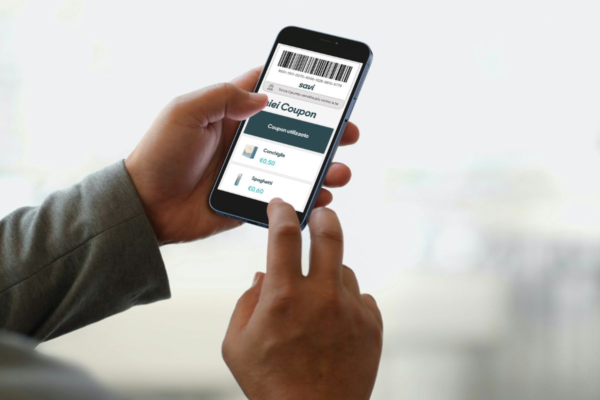 Coupon digitali su smartphone. Risparmia con i coupon nel mercato italiano. Offerte e sconti 2025.