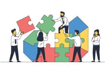 Team di lavoro Conad Centro Nord collabora per costruire un puzzle colorato, simbolo di valore condiviso e cooperazione.