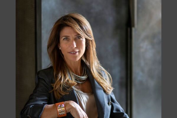 Ritratto professionale di Ilaria Rizzoli, manager di Delicius Rizzoli, in un contesto aziendale elegante e moderno.