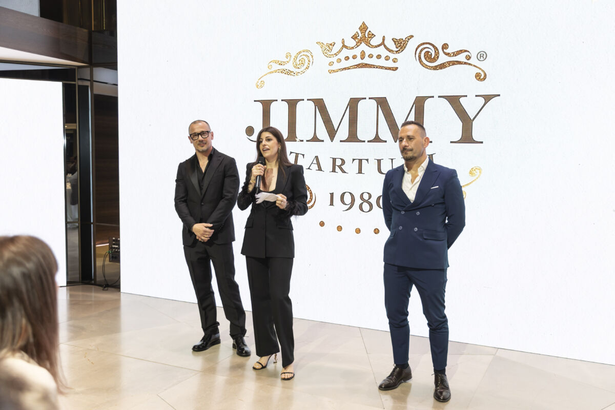 Jimmy Tartufi rebranding event. People on stage present premium Italian truffle brand.