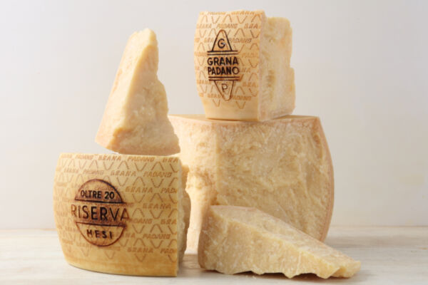 Grana Padano PDO cheese. Italian hard cheese with a granular texture. Riserva, aged over 20 months.