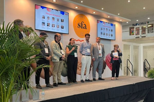 Italian Food Awards USA 2025 winners on stage. Jury of experts at the Specialty Food Association event.