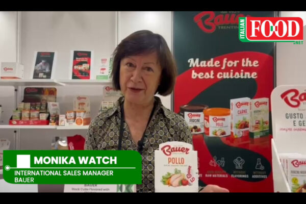 Monika Watch, Bauer International Sales Manager, at Summer Fancy Food Show 2025. Bauer Italian Food products on display.