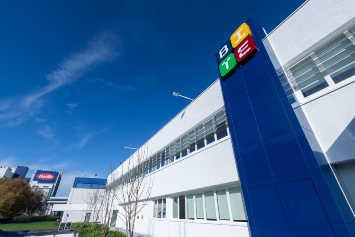 Barilla BITE Hub exterior. Food innovation center with modern architecture and blue sky.