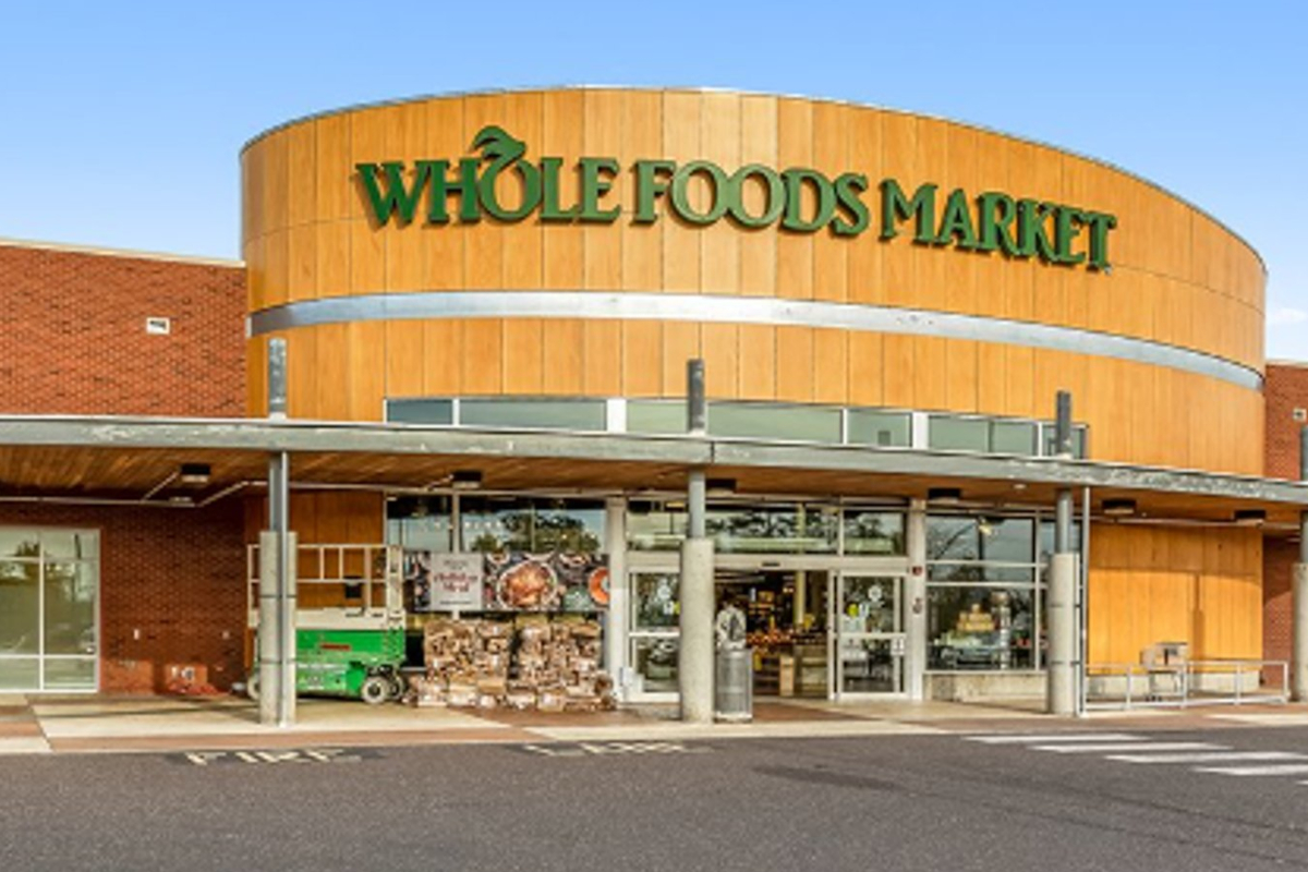 Whole Foods Market store exterior. Amazon store within a store partnership. Grocery shopping.