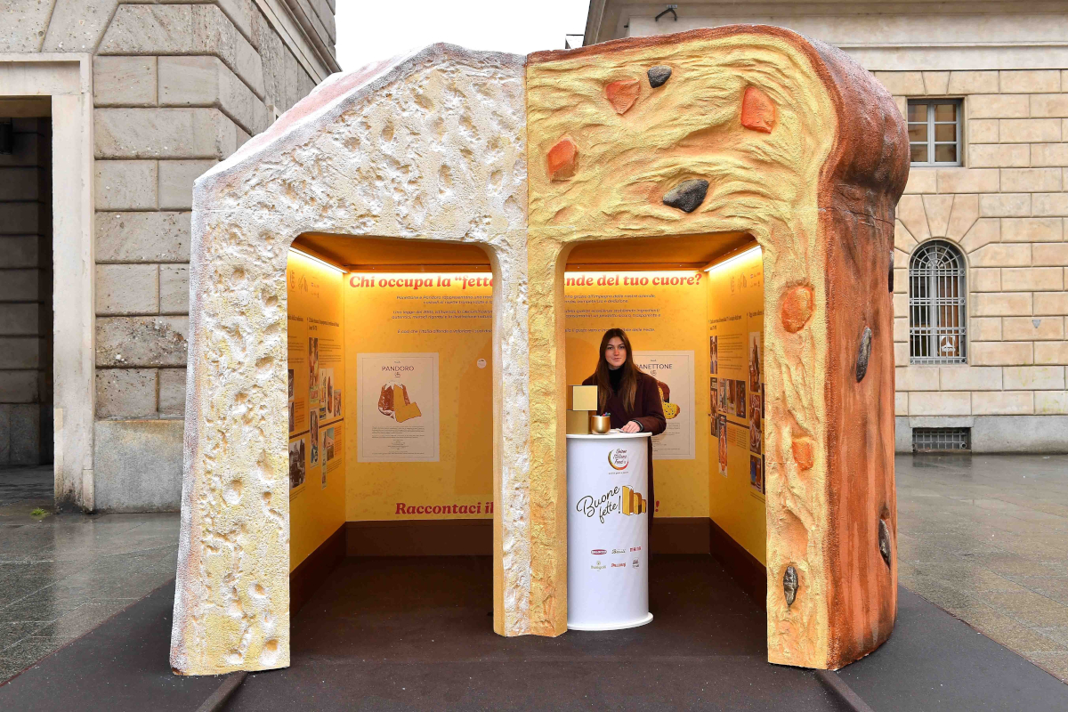 Panettone and Pandoro installation in Milano. Holiday food icons display. Italian food exports.