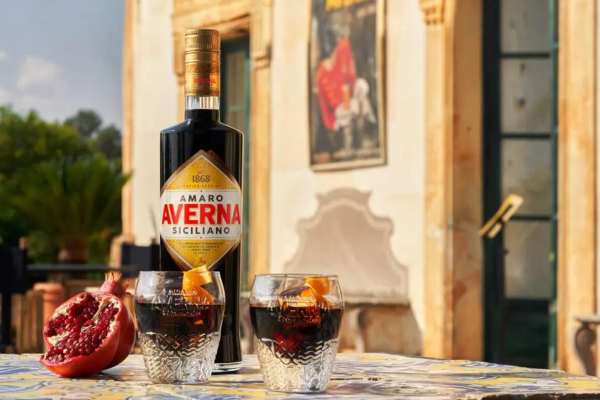 Amaro Averna bottle and cocktails. Sicilian Averna acquired by Illva Saronno Holding from Campari Group.