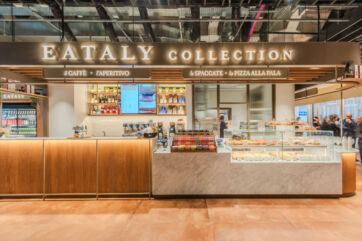Eataly Collection food counter. Italian cafe with pastries, coffee, pizza, and aperitivo. Modern restaurant design. - Avolta