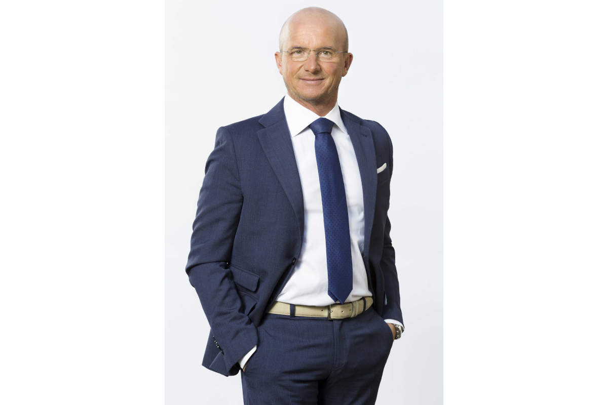 Domenico Battagliola, CEO La Linea Verde, in suit. Business leader portrait. Italian food industry executive.