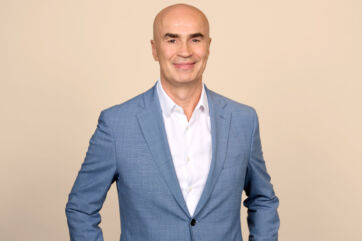 Ahold Delhaize CEO Claude Sarrailh in suit.