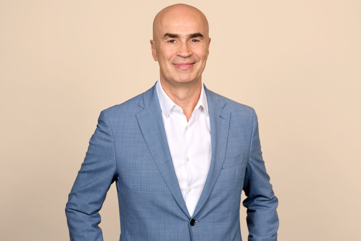 Ahold Delhaize CEO Claude Sarrailh in suit.