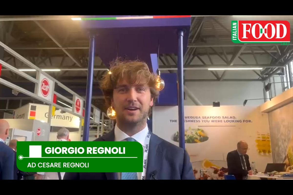 Giorgio Regnoli at PLMA trade show, showcasing seafood innovations for private label growth. Italian food.