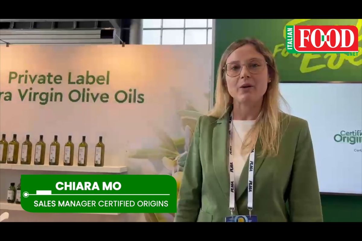 Private label extra virgin olive oils display. Chiara Mo, sales manager, Certified Origins. Authentic EVO and tomato sauces.