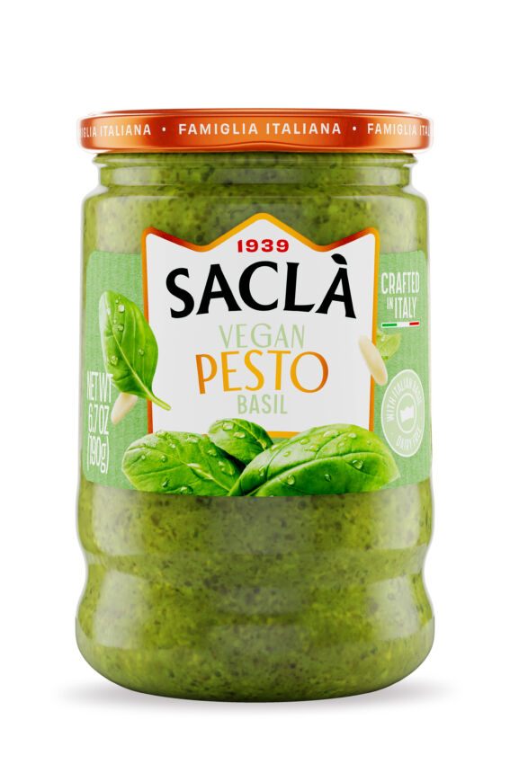 Jar of Saclà Vegan Basil Pesto, a finalist in the 2026 Italian Food Awards USA, featuring fresh Italian basil leaves.