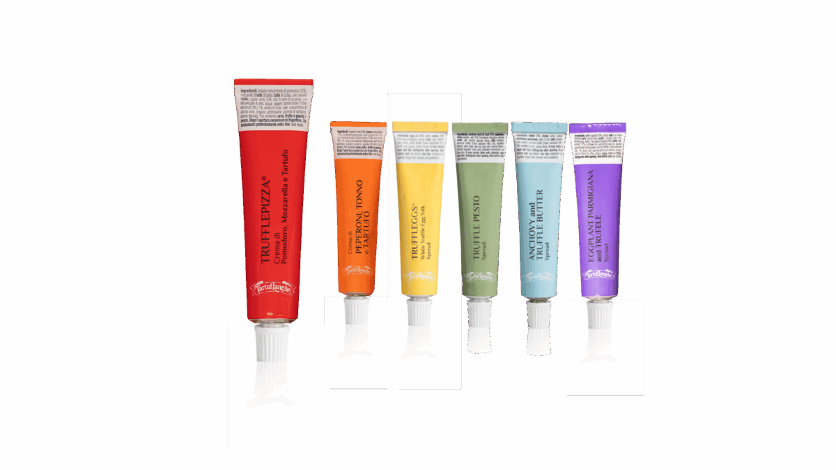 Assorted Tartuflanghe gourmet Italian truffle spreads and creams in colorful tubes, 2026 Italian Food Awards USA finalist.