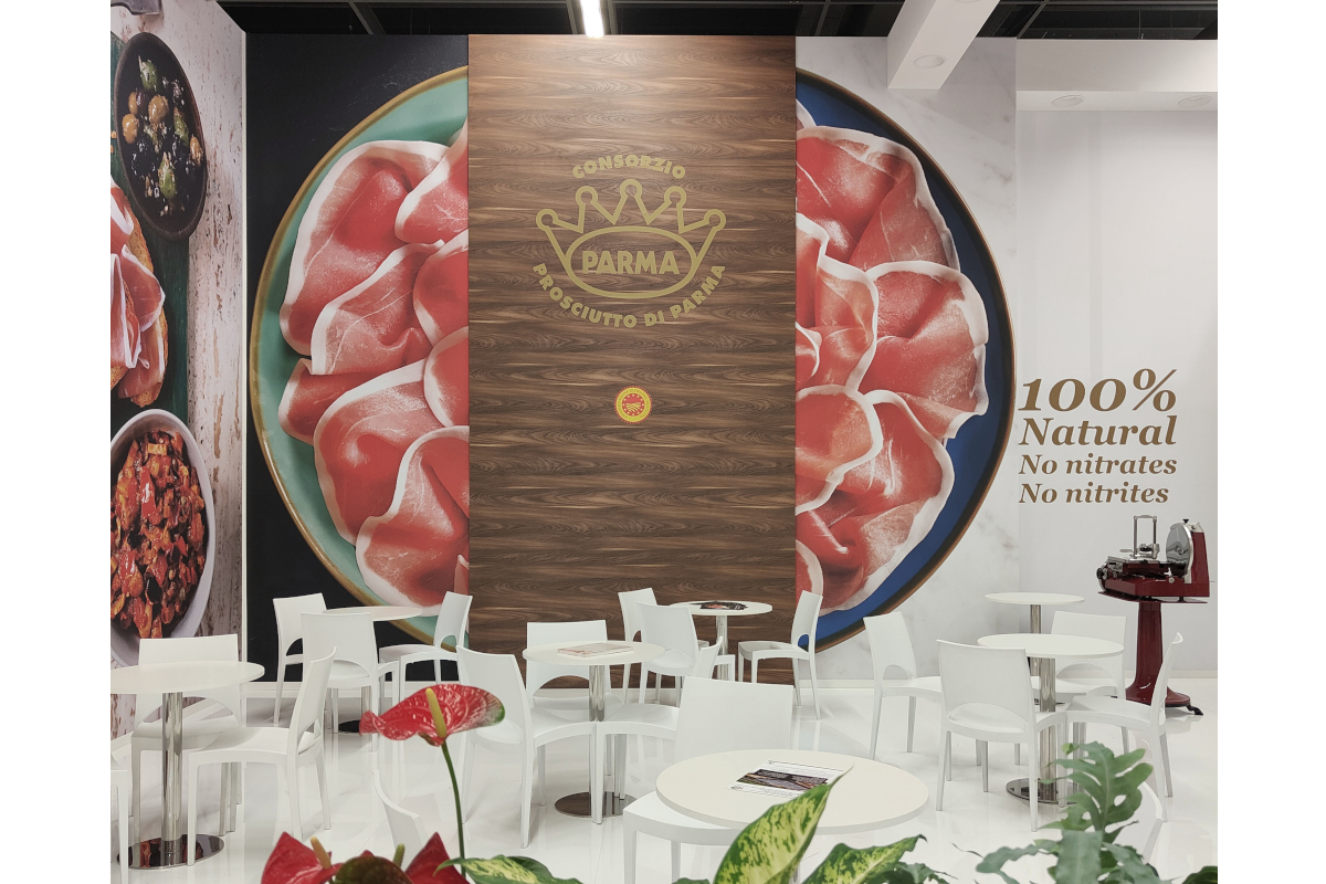 Prosciutto di Parma PDO Consortium trade show booth featuring sliced ham, branding, and 100% natural signage at SFFS 2026.
