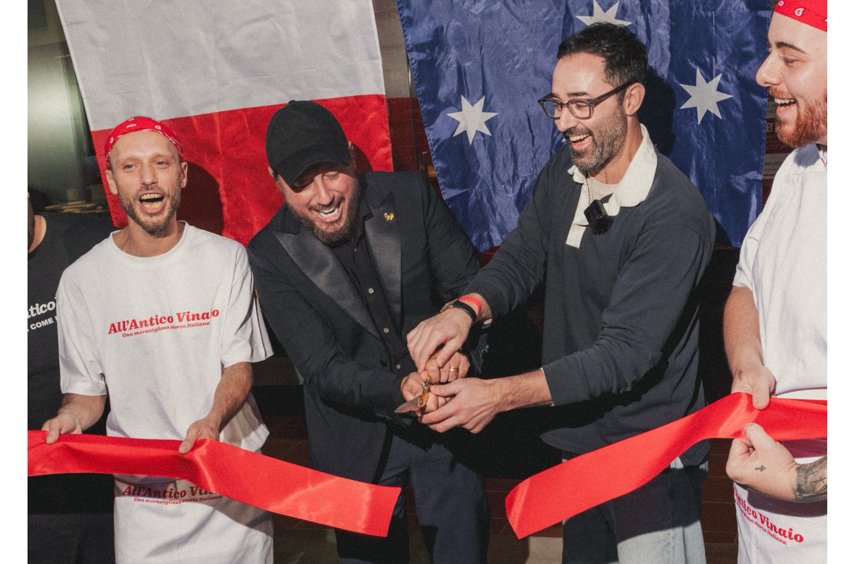 All'Antico Vinaio team members celebrating the Australia store opening with a red ribbon cutting ceremony.