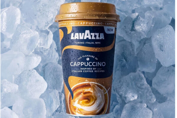 Lavazza ready-to-drink chilled cappuccino cup surrounded by ice cubes, highlighting the new partnership with Müller.
