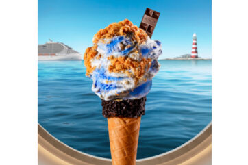 Venchi gelato cone with chocolate and cookie topping, viewed through a cruise ship porthole with a ship and lighthouse.