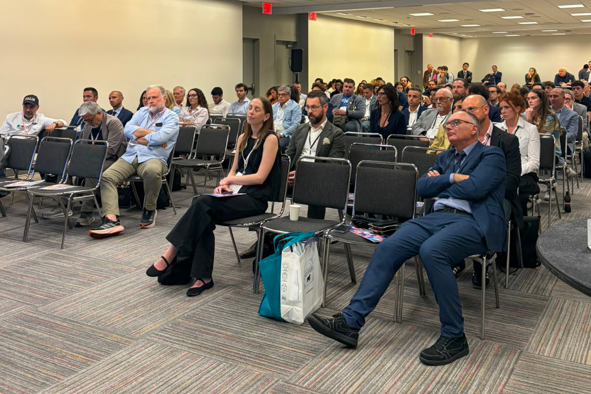 Audience seated in a conference room attending the Italian Food Awards USA 2026 winners presentation.