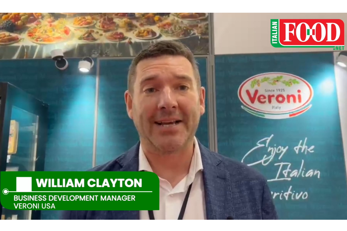 William Clayton, Veroni USA Business Development Manager, speaking at the SFFS 2026 event with Veroni branding in the back.