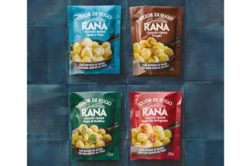 Rana Cuor di Sugo stuffed gnocchi range in four flavors: blue, brown, green, and red packaging on a blue tiled surface.
