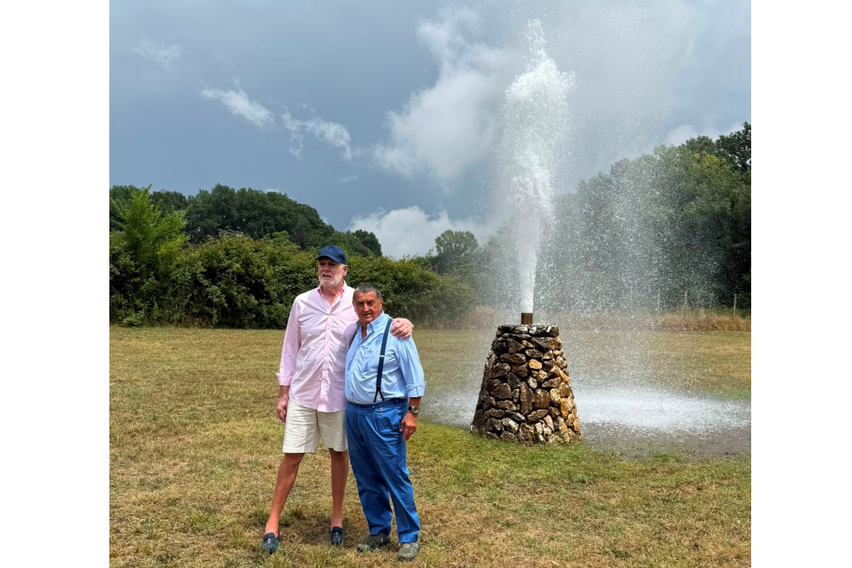 Spencer Vultaggio of AriZona Beverages and Carlo Pontecorvo of Ferrarelle stand together by the Ferrarelle Geyser.