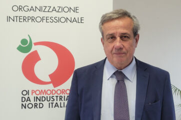 Giuseppe Romanini, President of OI Pomodoro da Industria Nord Italia interprofessional organization logo backdrop