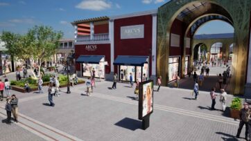 Rendering del Roma Outlet Village: piazza con negozi e arco monumentale, apertura 6 novembre.