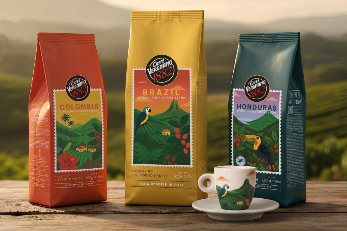 Tre confezioni Caffè Vergnano Single Origin monorigini Colombia, Brasile e Honduras con tazzina su tavolo in legno