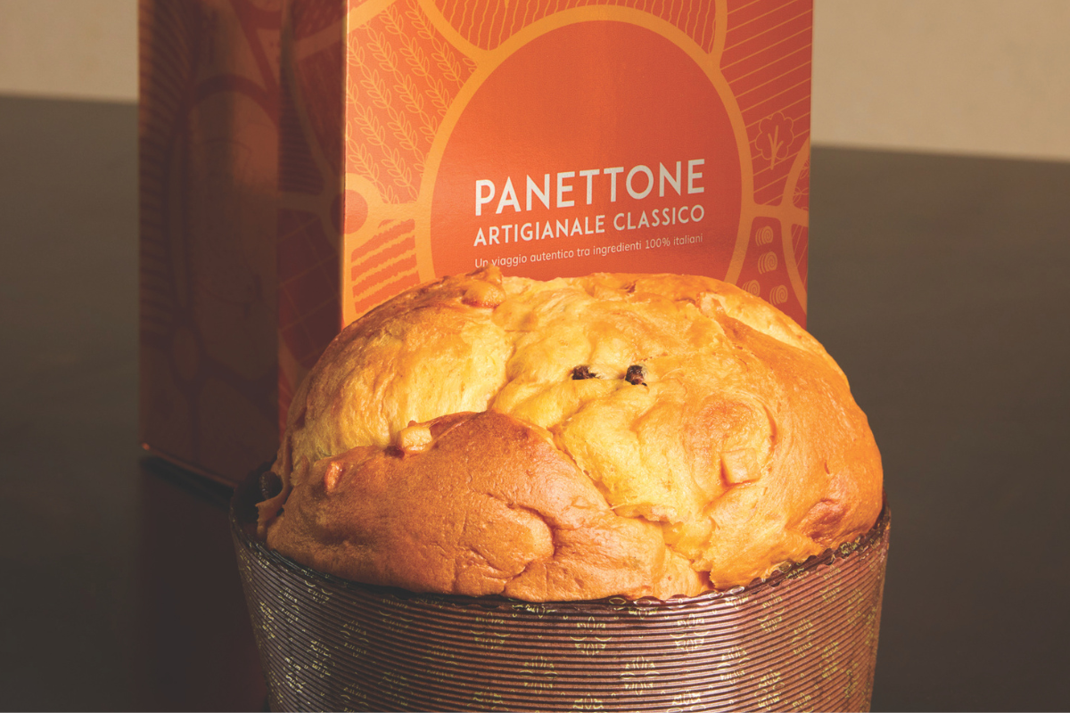 Panettone classico artigianale Gustodi della bontà con confezione arancione. Dolce tradizionale italiano.