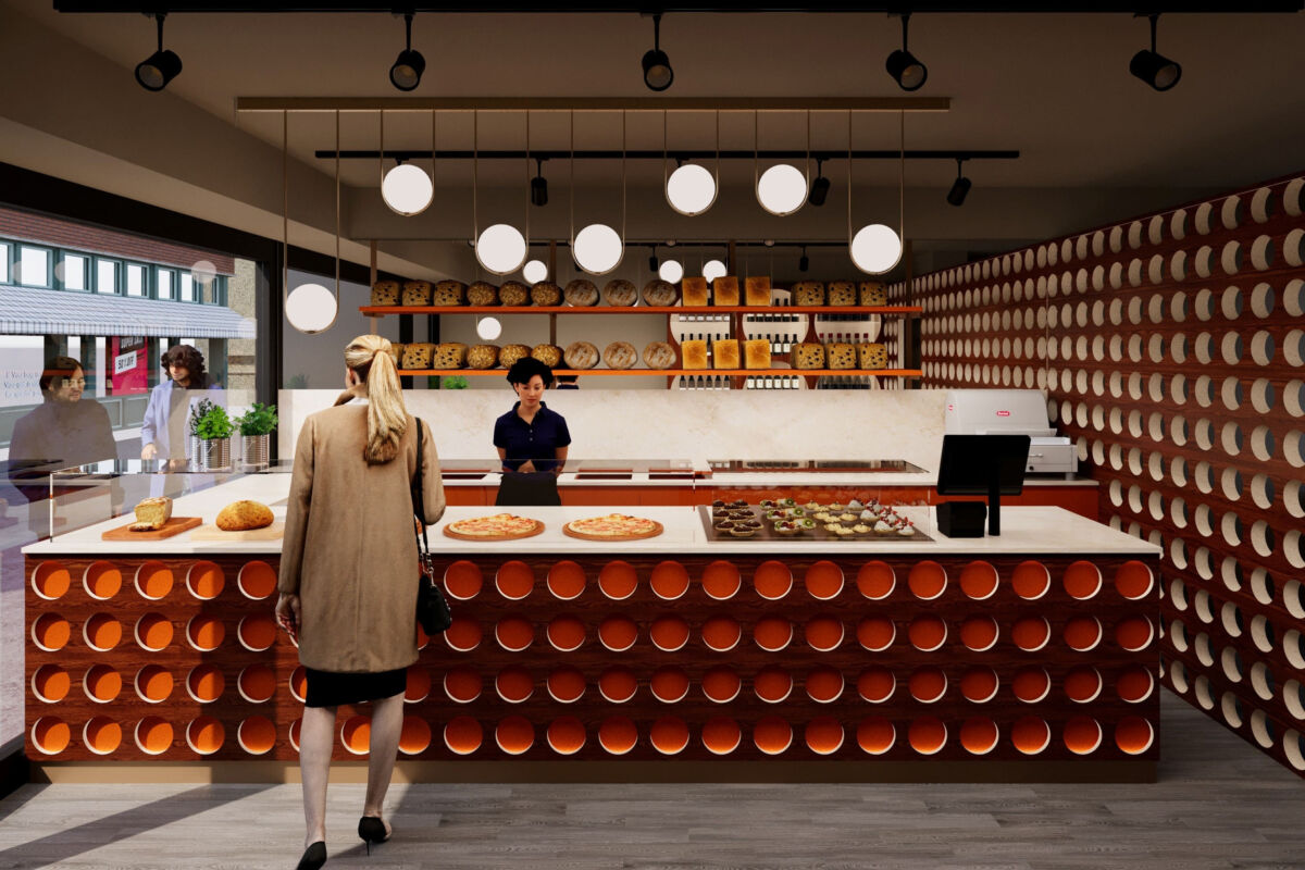 Interni del panificio Matre di Massimiliano Prete. Pane artigianale, pizza e dolci in esposizione. Design moderno e accogliente.