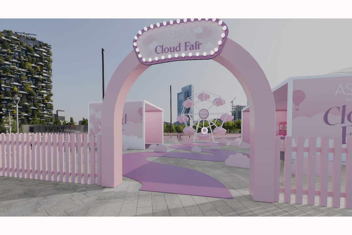 Astra Playland: Luna park beauty per Cloud Fair. Arco rosa, ruota panoramica e atmosfera fiabesca.