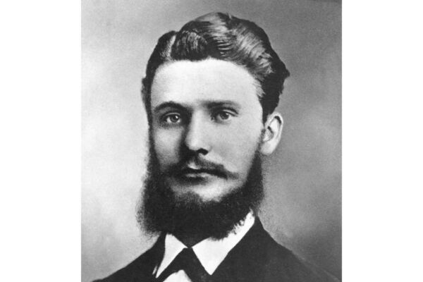 Ritratto d'epoca in bianco e nero del fondatore Henkel, figura chiave nella storia dell'azienda.