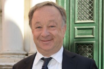 Marco Bordoli, nuovo membro del CdA di Dit. Ritratto di un uomo sorridente in giacca e cravatta.