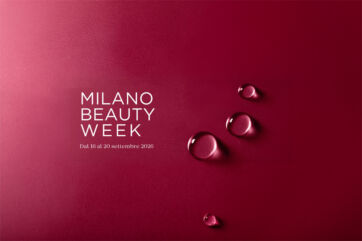 Milano Beauty Week 2026: gocce su sfondo rosso, evento cosmetica e consumi in Lombardia
